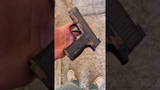 Sig sauer p365XL hybrid with fiber laser and hand stippling