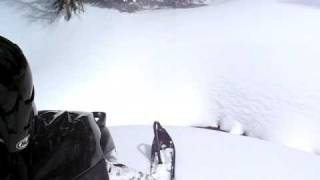 An a-hole on a Snowmobile in a hole!!!!!!!!!