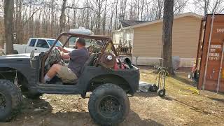 Pushing a tree over with my Suzuki Samurai