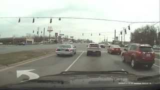 2 Radcliff, KY police officers Breaking the law by Running RED light