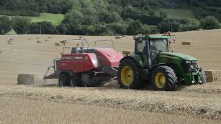 John Deere 7920 Power Barking Away With A Massey 2270XD Baler Working the Bank