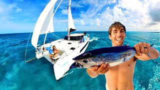 Catching Dinner from our Boat (home) in Some of the Clearest Waters in the World!