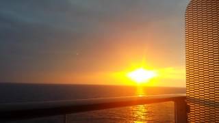 Celebrity reflection sunset at sea