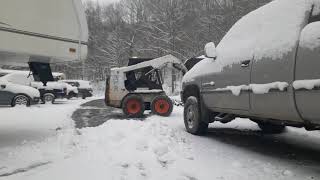 Bobcat 753 Skid steer plowing snow