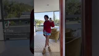 emma chamberlain shows off her outfit with grandma voice