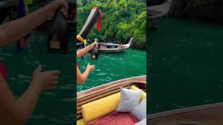 Popping bottles on my private boat tour in Krabi, Thailand