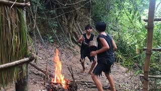 Primitive technology | boys catching fish in the river