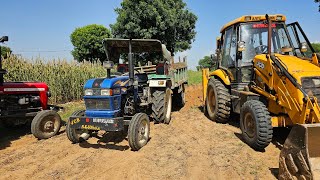 Jcb 3dx Backhoe Machine Loading Mud in Massey and Eicher tractors