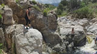 Girl Cliff Jumping near Chiva Falls, Redington Pass