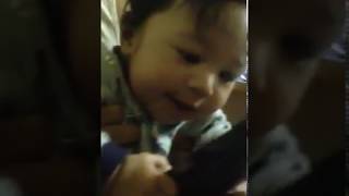 5 month old baby talking on the  phone