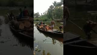 തോണിയില് മരം മുറിച്ചു കൊണ്ട് പോണത്