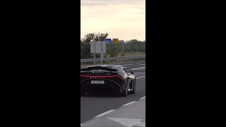 Bugatti la voiture noire. Drive. Exhaust sound.