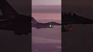 The flight of a military fighter at sunset is beautiful