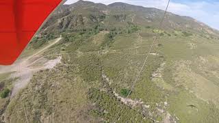 First person view hang glider landing.