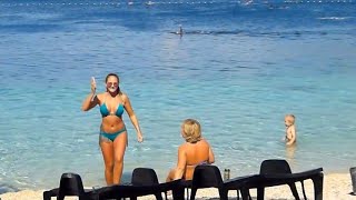 Girls on the beach, Makarska riviera, Croatia.