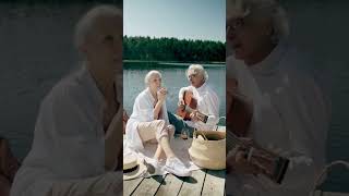 Grandpa and Grand Ma On Picnic, playing Guitar.