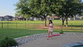 Mila flies her first kite.