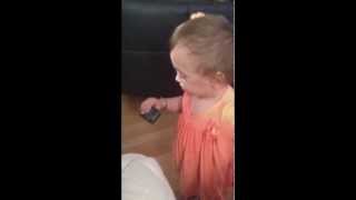 Baby Miabella talking on mobile phone