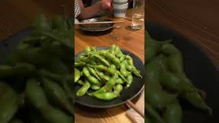 Tokyo food. The most delicious edamame in the world. Slathered in garlic. A lot of garlic