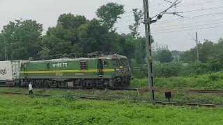 WAG-9 With Freight Train Crossing With Tirunelveli Humsafar Express At Geratpur In Monsoon Season