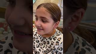 Getting her ears pierced..... at the same time!