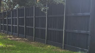 Someone built a NAVY BLUE fence, along with some cedar shutters