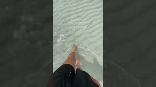 Girl Walking On White Sand Of Sea Water