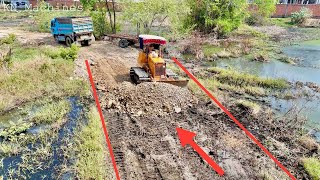 Installing New Driveway Use Bulldozer Pushing For Dump Truck 5T Unloading Soil Into Water