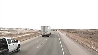 I-80EB Wyoming - Driver can't keep it between the lines.