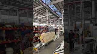 Furniture factory application - lifting table and unpowered roller conveyor connection