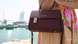 "Begin Over" with this luxury leather handbag