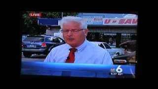 Jamaican Man Dancing Behind A News Reporter