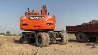 Doosan Excavator Loading Mud