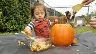 Alex helping Ruth carve a pumpkin. Halloween 2019