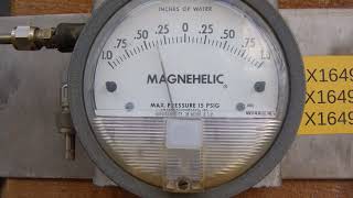 Magnehelic pressure gage response in presence of combustion instabilities