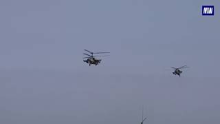 Ka-52 attack helicopters of the Russian Aerospace Forces destroying enemy strongholds