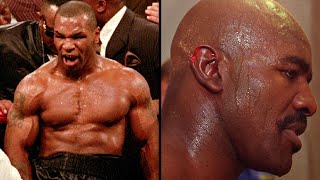 Mike Tyson bites off Evander Holyfield's ear and fights security