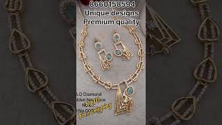 Beautiful unique designs premium quality AD necklace set with three tones....WhatsApp at 8660158594.