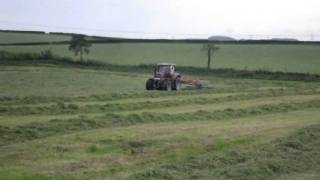 Silage 2011 - Case 155 raking with fella rake