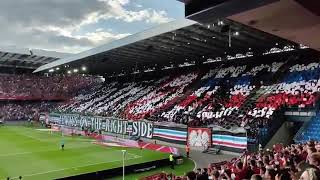 Banner of Polish fans during Wisla Krakow vs Rapid Wien: Patriots are always on the right side