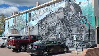 "Steam Engine Locomotive" painting on "The Caboose Market Cafe" bldg. in Ashland Va. next to tracks.