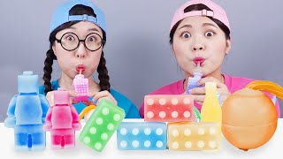 Kẹo chai sáp tráng miệng cầu vồng Mukbang DONA