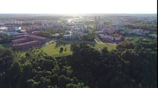 Aerial - drone flying towards the city