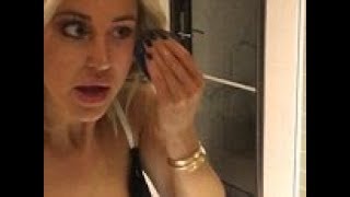 Roxy Jacenko removes her makeup while wearing lace lingerie