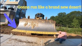 PUTTING NEW CUTTING EDGES ON THE DOZER, AND GRADING THE POND!!