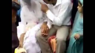 Groom slapps his bride