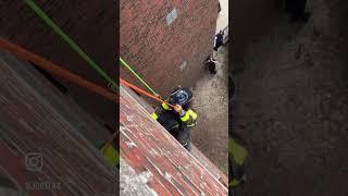 Making a rescue from above the fire! Roof rope rescue demo #shorts #firefighting