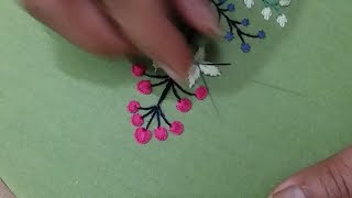 Hand embroidery, beautiful, easy flower pattern with cotton threads on cotton cloth