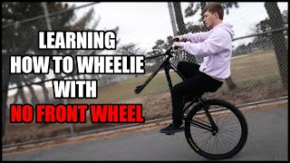 Learning to Wheelie with No Front Wheel