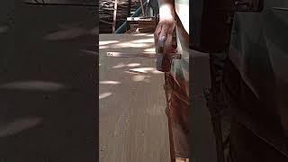 technically of cleaning wood with hand saw by electric planer.